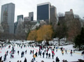 Tiny People having fun in the city enjoying a nice ice skating time during winter in New York City. Tiny People having fun in the city enjoying a nice ice skating time during winter in New York City. - PhotoDune Item for Sale