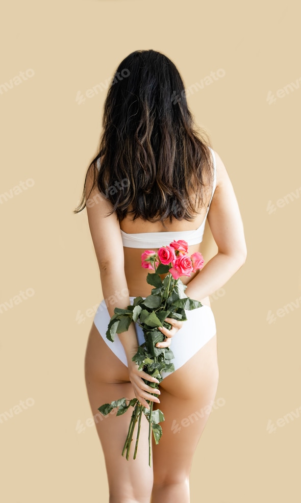 sexy asian girl in white lingerie holding a pink rose against beige background Stock Photo by nikolast1 sexy asian girl in white lingerie holding a pink rose against beige background Stock Photo by nikolast1