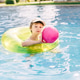 Little boy has a fun with pink ball on swimming pool. Little boy has a fun with pink ball on swimming pool. - PhotoDune Item for Sale