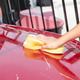 red car in soap foam on the car wash with yellow sponge. red car in soap foam on the car wash with yellow sponge. - PhotoDune Item for Sale
