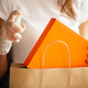 Close up of woman in protective gloves disinfecting shopping Close up of woman in protective gloves disinfecting shopping - PhotoDune Item for Sale