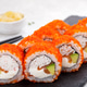 Sushi roll of crab, avocado, Philadelphia and orange caviar Sushi roll of crab, avocado, Philadelphia and orange caviar - PhotoDune Item for Sale