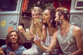 Hipsters blowing bubbles in camper van on a summers day Hipsters blowing bubbles in camper van on a summers day - PhotoDune Item for Sale