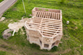Aerial view of a brick house with wooden ceiling frame under construction Aerial view of a brick house with wooden ceiling frame under construction - PhotoDune Item for Sale