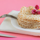 Fried pancakes close-up on a white plate, pancakes with raspberries Fried pancakes close-up on a white plate, pancakes with raspberries - PhotoDune Item for Sale