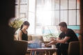 Two businesspeople meeting in lobby area of modern office Two businesspeople meeting in lobby area of modern office - PhotoDune Item for Sale