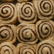 Uncooked cinnamon roll buns ready to bake. Baking food. Breakfast pastry.Cinnamon buns.Spices,sugar Uncooked cinnamon roll buns ready to bake. Baking food. Breakfast pastry.Cinnamon buns.Spices,sugar - PhotoDune Item for Sale