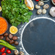 Overhead view of dinner cooking with eggs fresh vegetables spices eggs fallen oil bottle green Overhead view of dinner cooking with eggs fresh vegetables spices eggs fallen oil bottle green - PhotoDune Item for Sale