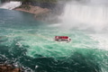 Minimalistic view of boat with tiny people in Niagara Falls with rainbow reflection on the water. Minimalistic view of boat with tiny people in Niagara Falls with rainbow reflection on the water. - PhotoDune Item for Sale