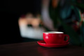 Red hot coffee cup on wooden table Red hot coffee cup on wooden table - PhotoDune Item for Sale