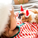 Holiday Pets Christmas guinea pig Cute boy hugs his pets guinea pig Boy in red Santa Hat Holiday Pets Christmas guinea pig Cute boy hugs his pets guinea pig Boy in red Santa Hat - PhotoDune Item for Sale