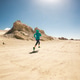 Fitness woman trail runner cross country running on sand desert Fitness woman trail runner cross country running on sand desert - PhotoDune Item for Sale