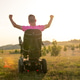 Man in wheelchair celebrating victory and enjoying life Man in wheelchair celebrating victory and enjoying life - PhotoDune Item for Sale