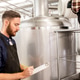 men working at craft brewery or beer plant men working at craft brewery or beer plant - PhotoDune Item for Sale