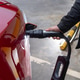 Hand Plugging Electric Car at Charging Station Hand Plugging Electric Car at Charging Station - PhotoDune Item for Sale