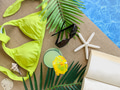 Summer flat lay with bikini a drink and mockup friendly open book next to pool for tropical concept Summer flat lay with bikini a drink and mockup friendly open book next to pool for tropical concept - PhotoDune Item for Sale