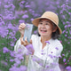 Happy Asian Senior Woman Taking Selfie in Purple Flower Field Happy Asian Senior Woman Taking Selfie in Purple Flower Field - PhotoDune Item for Sale