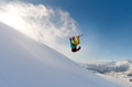 girl snowboarder jumping front flip leaving a wave of snow girl snowboarder jumping front flip leaving a wave of snow - PhotoDune Item for Sale