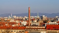 Brick chimney and rooftops of houses in Ljubljana, Slovenia. Brick chimney and rooftops of houses in Ljubljana, Slovenia. - PhotoDune Item for Sale