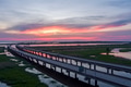 Drone shot of Mobile Bay at sunset Drone shot of Mobile Bay at sunset - PhotoDune Item for Sale