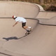 Cool skateboarder outdoors - Afroamerican guy jumping with his skate and performing a trick Cool skateboarder outdoors - Afroamerican guy jumping with his skate and performing a trick - PhotoDune Item for Sale
