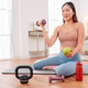 Woman taking a break after home workout, sitting on yoga mat with dumbbells, kettlebell Woman taking a break after home workout, sitting on yoga mat with dumbbells, kettlebell - PhotoDune Item for Sale