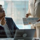 Mature professional company leader working sitting at boardroom table in office Mature professional company leader working sitting at boardroom table in office - PhotoDune Item for Sale