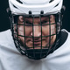 Portrait of sportsman in hockey uniform over black background Portrait of sportsman in hockey uniform over black background - PhotoDune Item for Sale