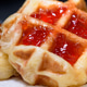 Close up fresh waffles with above strawberry jam Close up fresh waffles with above strawberry jam - PhotoDune Item for Sale