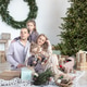 A happy family and pets in a bedroom at home on Christmas morning. New Year's. A happy family and pets in a bedroom at home on Christmas morning. New Year's. - PhotoDune Item for Sale