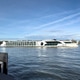 Elegant five-star river cruise ship MS George Eliot passing the city of Dordrecht Elegant five-star river cruise ship MS George Eliot passing the city of Dordrecht - PhotoDune Item for Sale