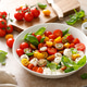Salad with fresh cherry tomatoes, mozzarella and basil leaves Salad with fresh cherry tomatoes, mozzarella and basil leaves - PhotoDune Item for Sale