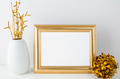 Landscape gold frame mockup with golden decor Landscape gold frame mockup with golden decor - PhotoDune Item for Sale