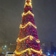 Illuminated Christmas Tree on a city street at winter night during a snowstorm Illuminated Christmas Tree on a city street at winter night during a snowstorm - PhotoDune Item for Sale