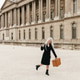 Beautiful girl with picnic basket posing in the city. Beautiful girl with picnic basket posing in the city. - PhotoDune Item for Sale