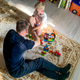 Dad plays with his son at home Dad plays with his son at home - PhotoDune Item for Sale