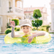 Little boy has a fun with pink ball on swimming pool. Little boy has a fun with pink ball on swimming pool. - PhotoDune Item for Sale