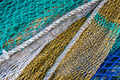 Background with close up of fishing nets, blue, green, yellow, white Background with close up of fishing nets, blue, green, yellow, white - PhotoDune Item for Sale