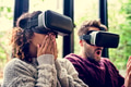 Young couple using VR together Young couple using VR together - PhotoDune Item for Sale