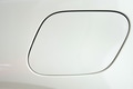 Petrol cap cover on a modern white car Petrol cap cover on a modern white car - PhotoDune Item for Sale