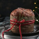 Festive Panettone Cake with Red Ribbon and Christmas Decor Festive Panettone Cake with Red Ribbon and Christmas Decor - PhotoDune Item for Sale