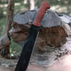 Machete knife on the tree stump Machete knife on the tree stump - PhotoDune Item for Sale