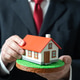 A man builds a house on land showing Real estate construction. Buying and selling property. A man builds a house on land showing Real estate construction. Buying and selling property. - PhotoDune Item for Sale