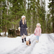 Woman and young girl walking small dog on snowy forest trail Woman and young girl walking small dog on snowy forest trail - PhotoDune Item for Sale
