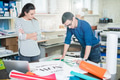 Printing banner in advertising company office Printing banner in advertising company office - PhotoDune Item for Sale