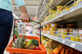 woman with food basket at grocery or supermarket woman with food basket at grocery or supermarket - PhotoDune Item for Sale