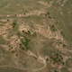 Baikal region. Dirt road on Tazheranskaya steppe near the stone rocks, called the Valley of the Baikal region. Dirt road on Tazheranskaya steppe near the stone rocks, called the Valley of the - PhotoDune Item for Sale