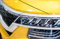 Close-up image of headlights of white modern car Close-up image of headlights of white modern car - PhotoDune Item for Sale