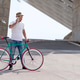 young man using his cellphone while going to work with his bicycle young man using his cellphone while going to work with his bicycle - PhotoDune Item for Sale