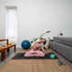 Pregnant Woman Performing Side Stretch Yoga At Home Pregnant Woman Performing Side Stretch Yoga At Home - PhotoDune Item for Sale